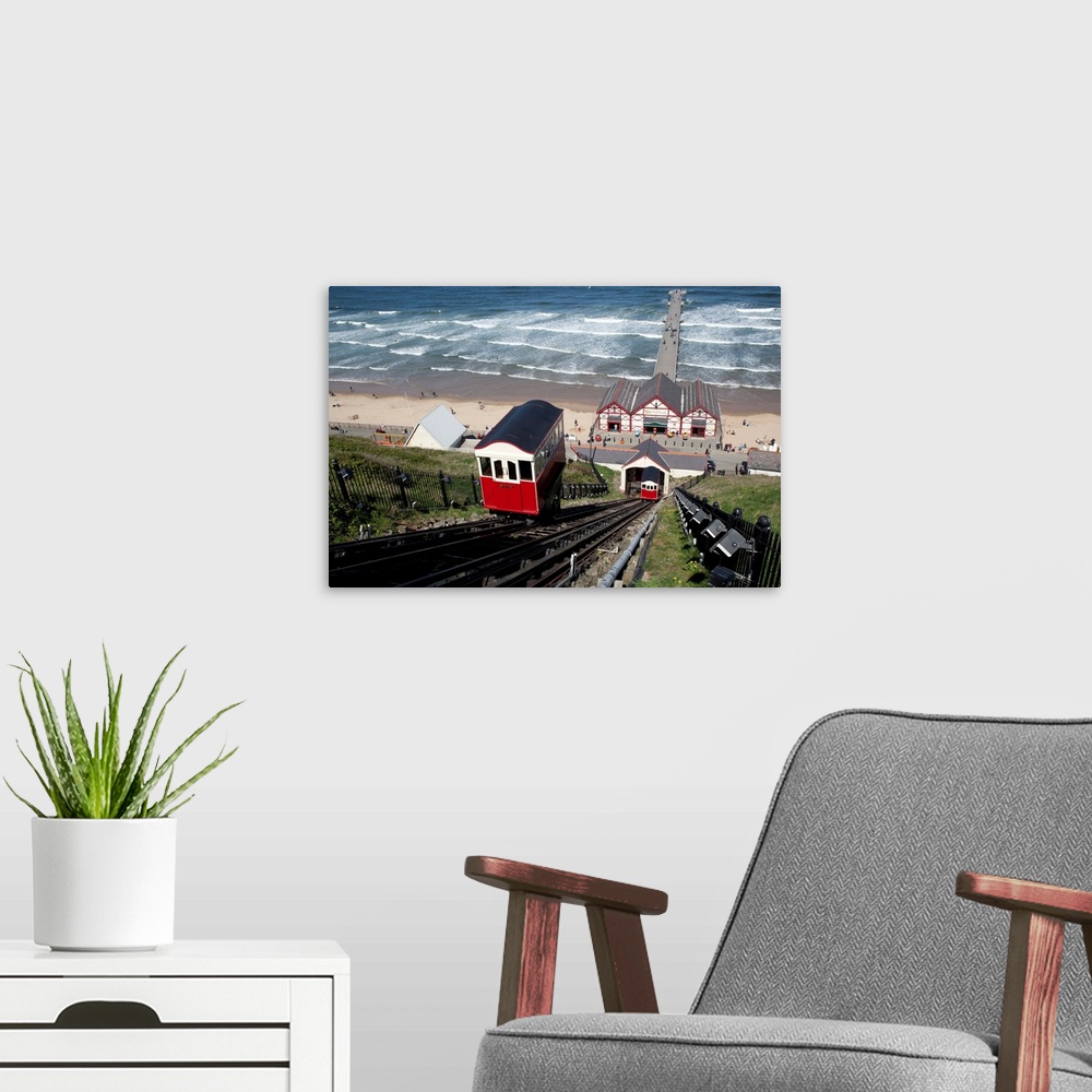A modern room featuring View of Funicular Railway, Pier and Sea at Saltburn on Sea, Cleveland.