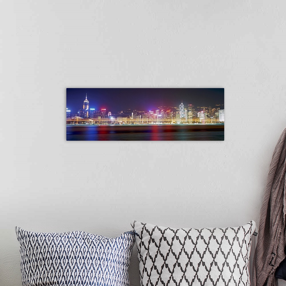 A bohemian room featuring View of Hong Kong harbour by night