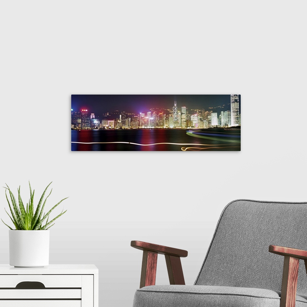 A modern room featuring View of Hong Kong harbour by night