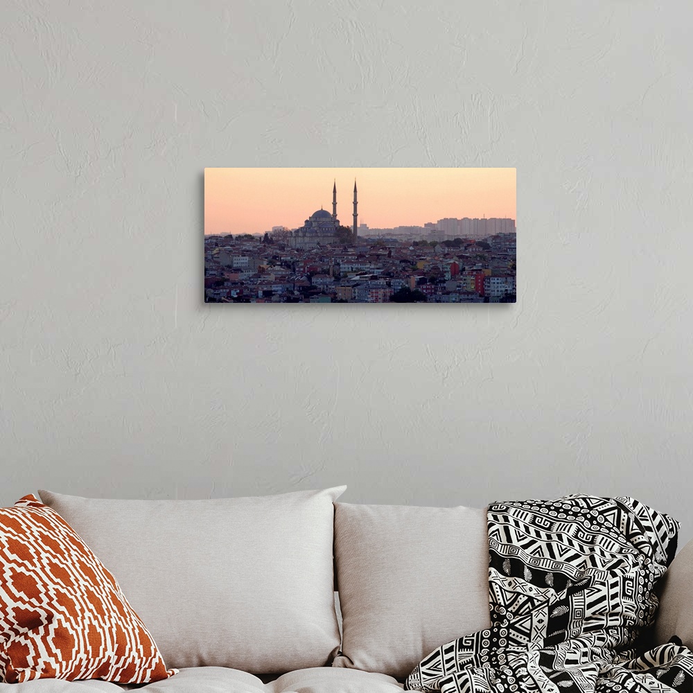 A bohemian room featuring View of Istanbul cityscape at sunset.