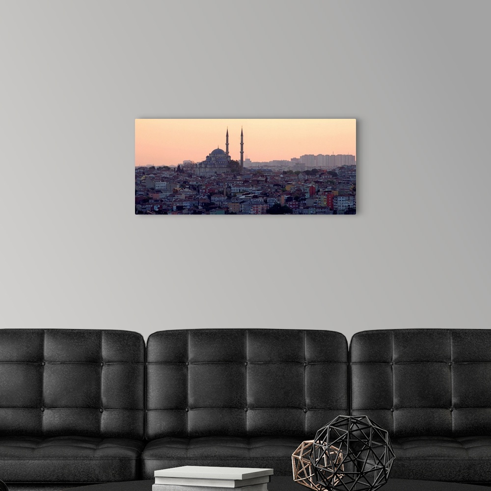 A modern room featuring View of Istanbul cityscape at sunset.