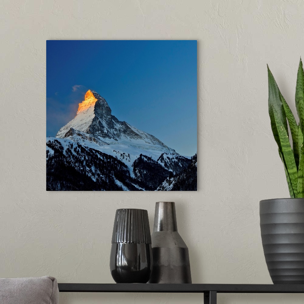 A modern room featuring View of Matterhorn, Alpes, in sunrise, blue sky in background.