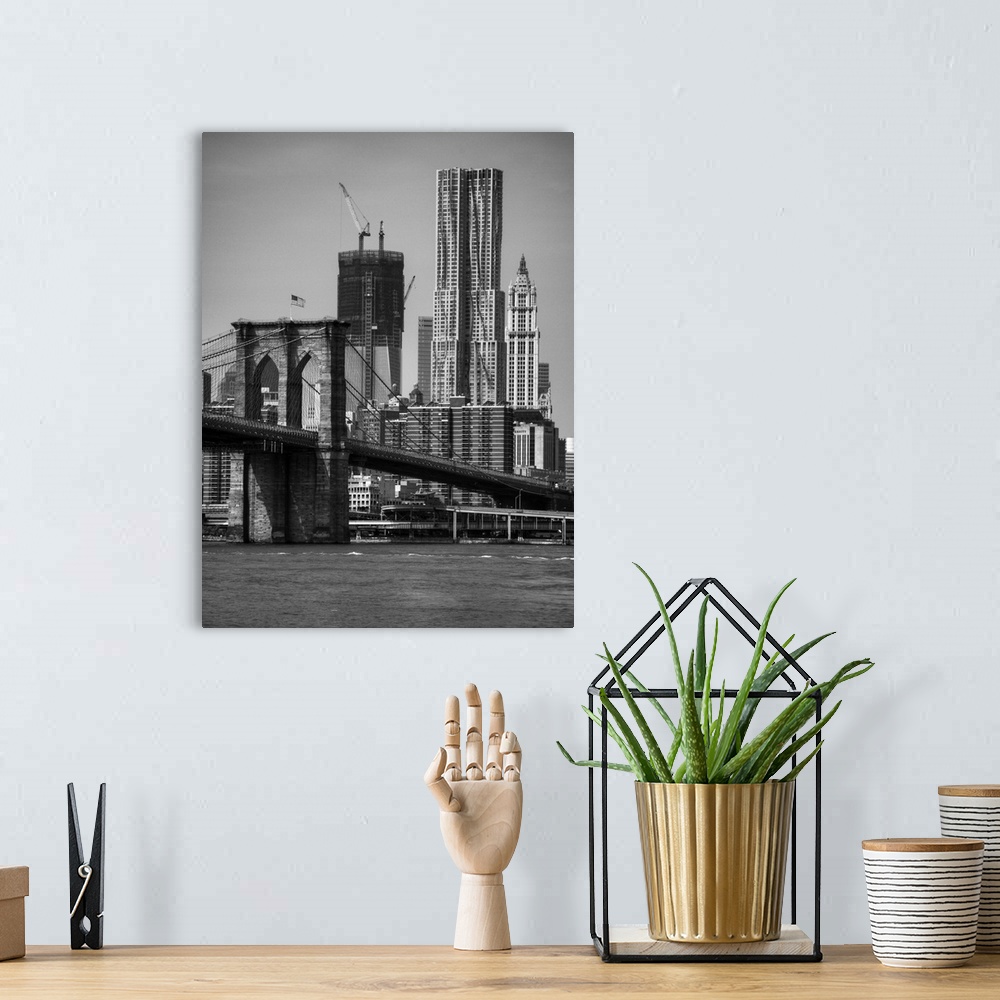 A bohemian room featuring View of One World Trade Center and brooklyn bridge in New York city skyline.