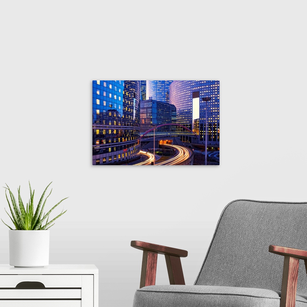 A modern room featuring View of Paris city at night, France.