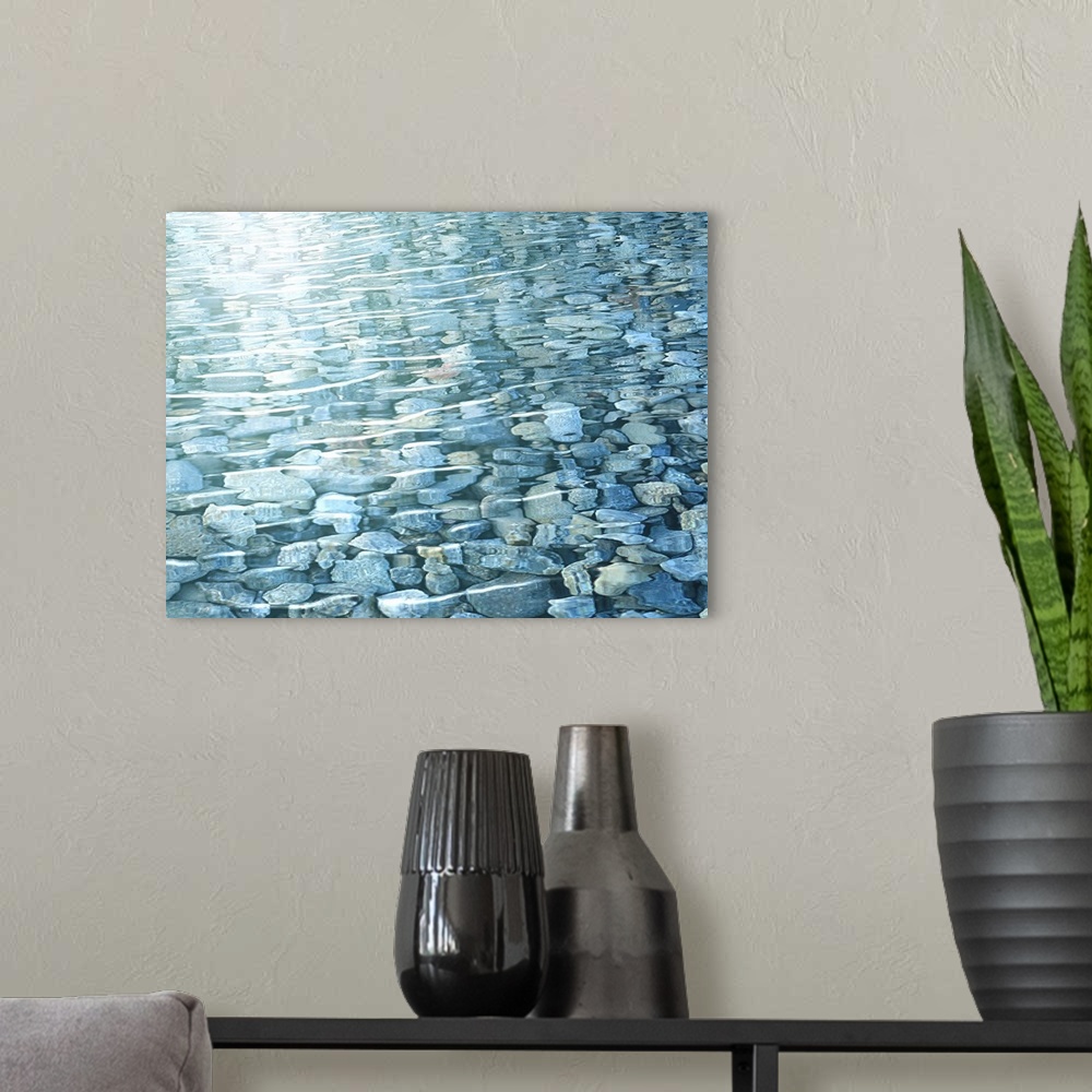 A modern room featuring View of rocks in water