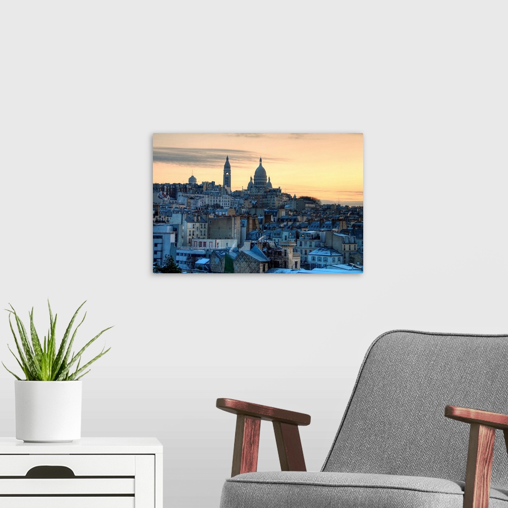 A modern room featuring View of Sacre Coeur and Montmatre in Paris at sunrise