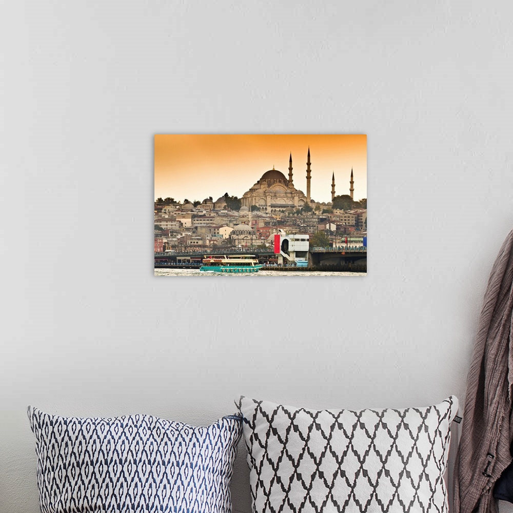 A bohemian room featuring View of Suleymaniye mosque and Galata bridge over Bosphorus strait in Istanbul, Turkey.