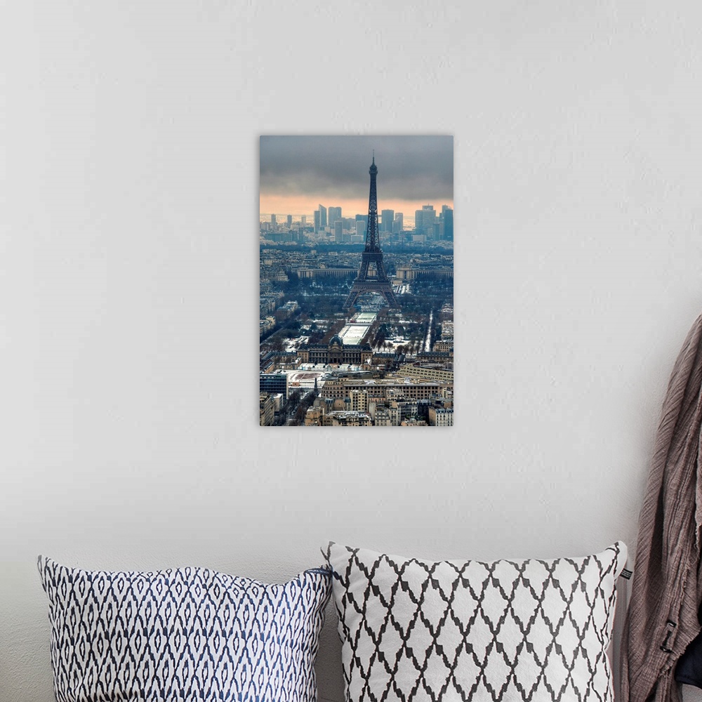 A bohemian room featuring View of the Eiffel tower taken at sunset in winter. La Defense can be seen in the background.