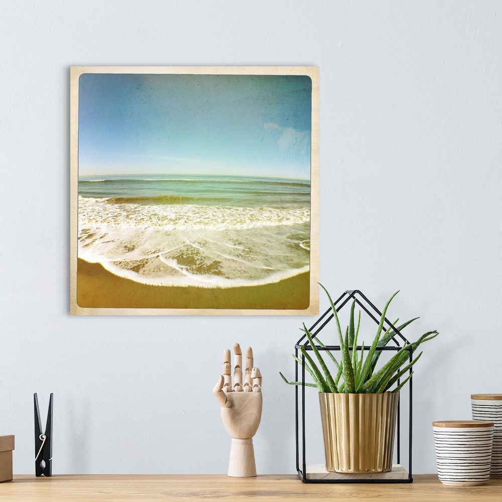 A bohemian room featuring View of tides as they roll onto sandy beach, California, US.