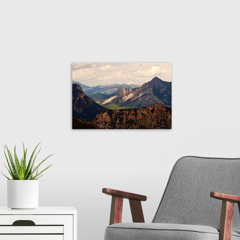 A modern room featuring View of Yellowstone mountain range from national park.