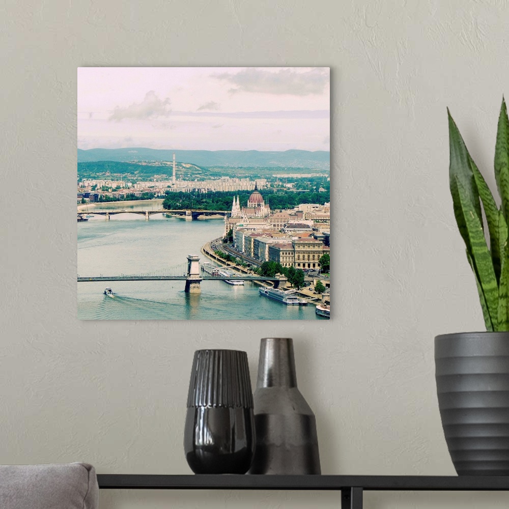 A modern room featuring View towards Hungarian Parliament on riverside of Danube.