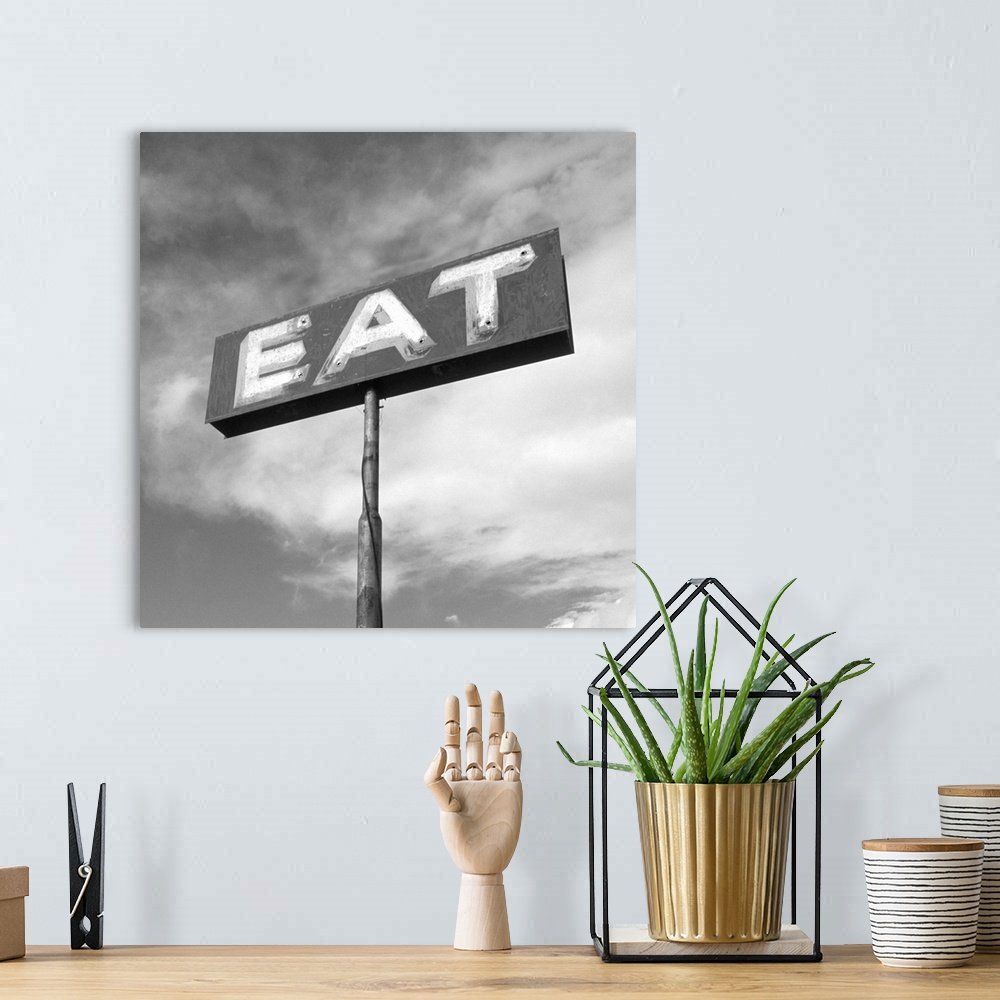 A bohemian room featuring Vintage "Eat" Restaurant Sign --- Image by .. Aaron Horowitz/CORBIS