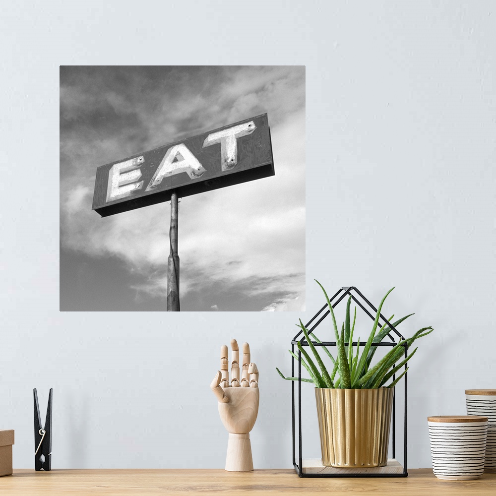 A bohemian room featuring Vintage "Eat" Restaurant Sign --- Image by .. Aaron Horowitz/CORBIS