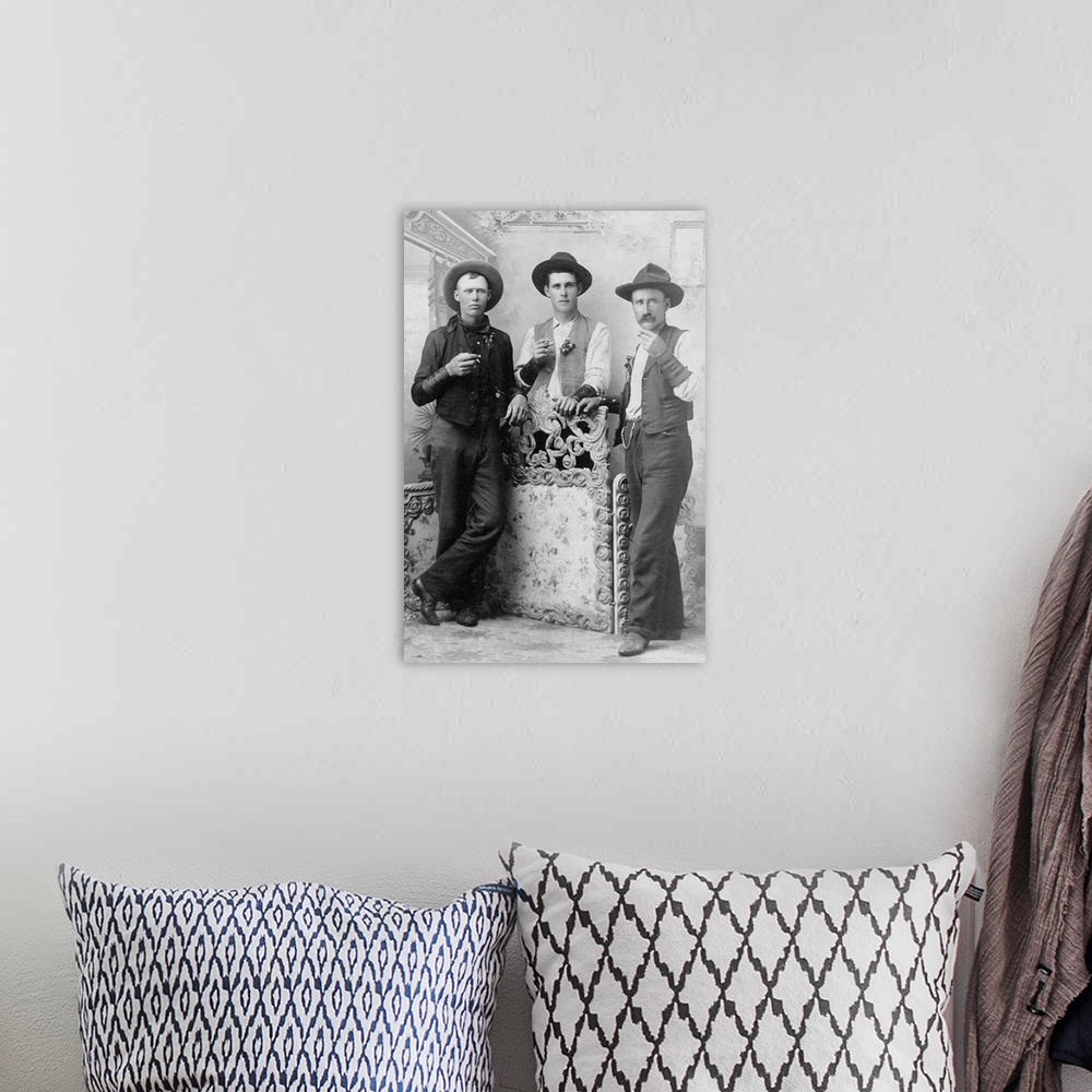A bohemian room featuring Vintage image of cowboys drinking and smoking