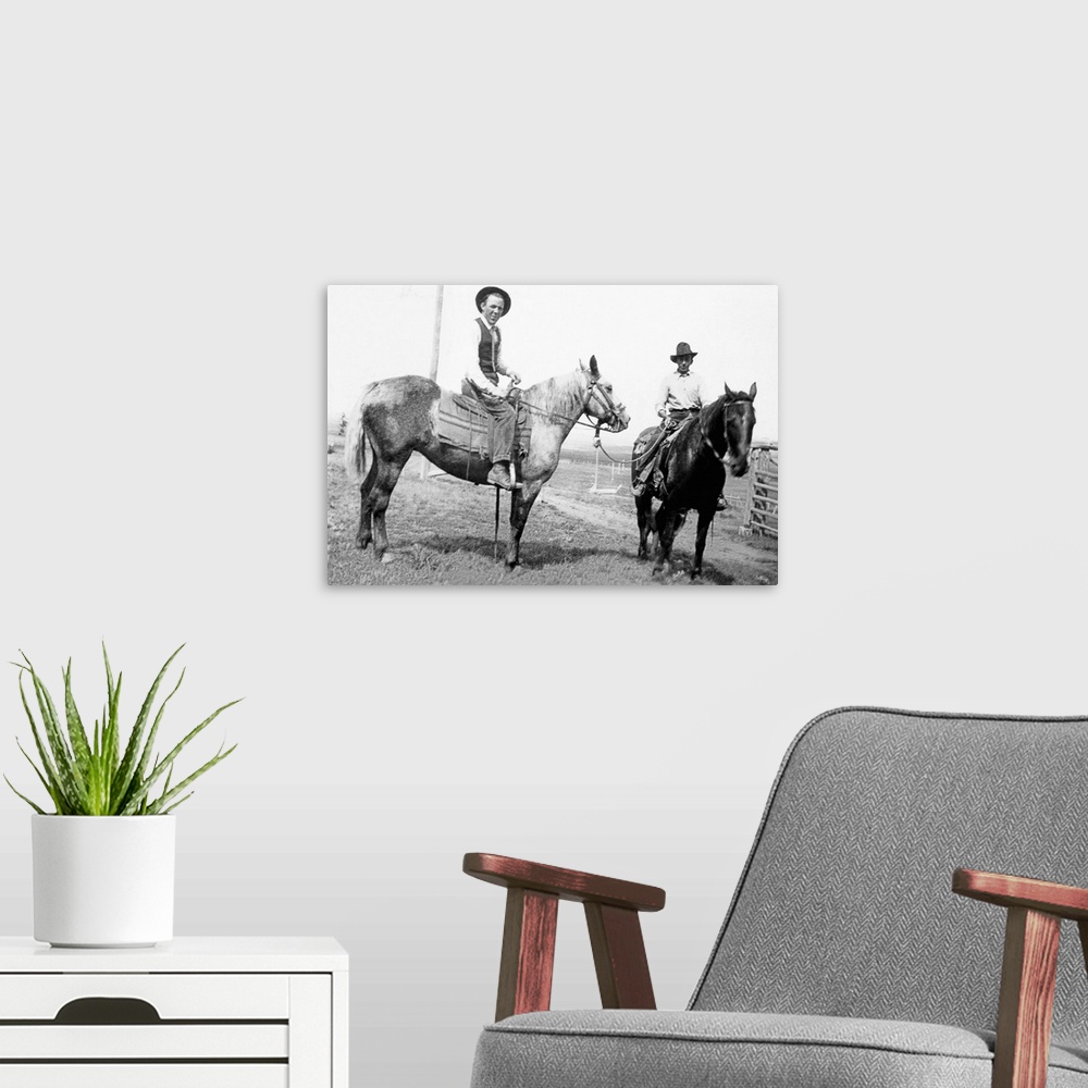 A modern room featuring Vintage image of men on horseback