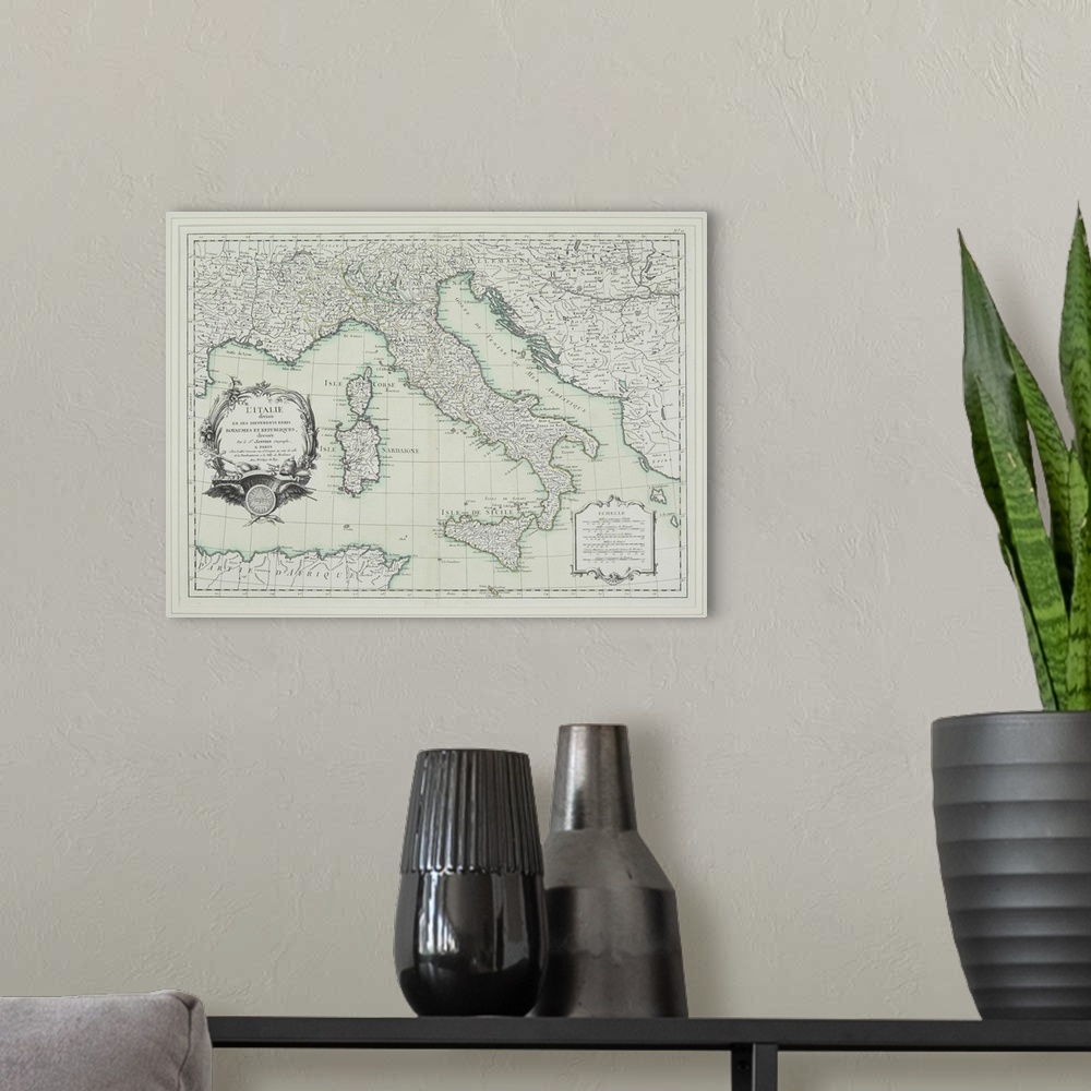 A modern room featuring Old French map of the Italian peninsula, including the islands of Corsica, Sardinia, and Sicily.