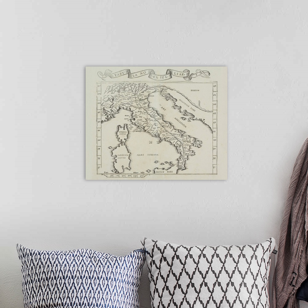 A bohemian room featuring Antiqued map of the Italian peninsula on canvas.