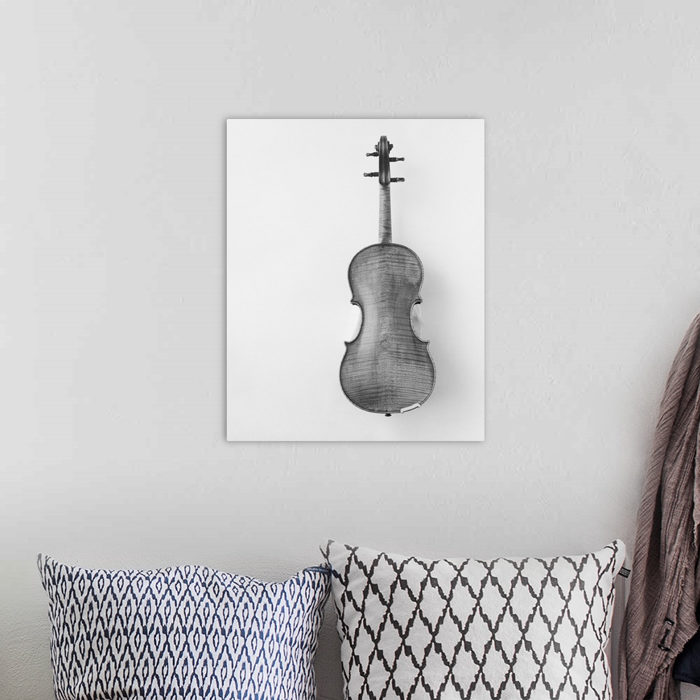 A bohemian room featuring Violin against white background, close-up