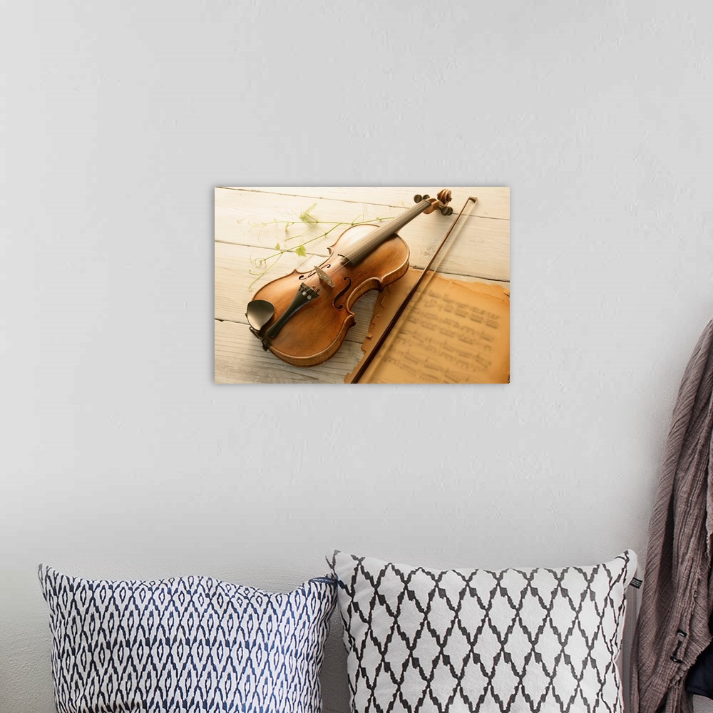 A bohemian room featuring Violin and music sheet