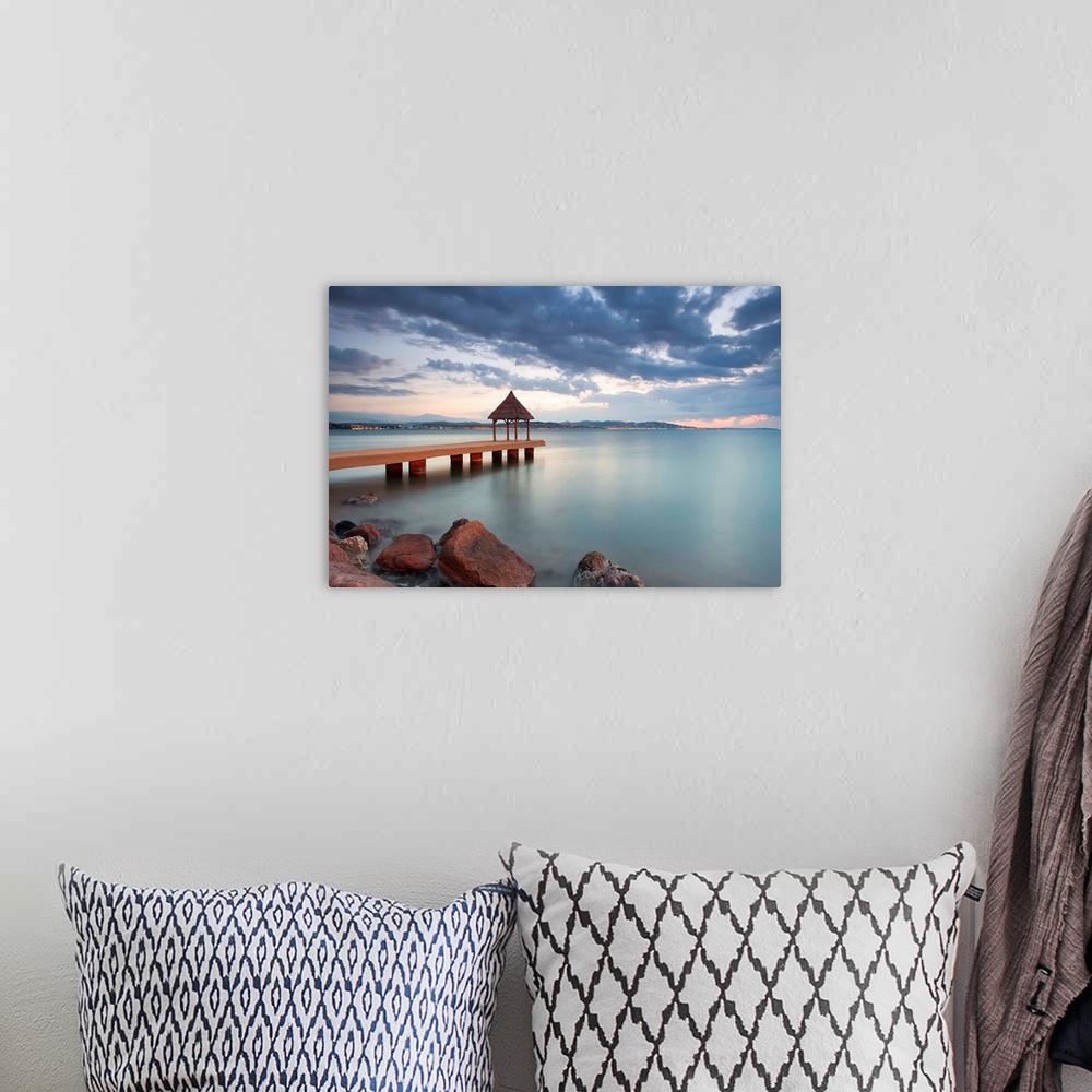 A bohemian room featuring Water-scape sunrise.