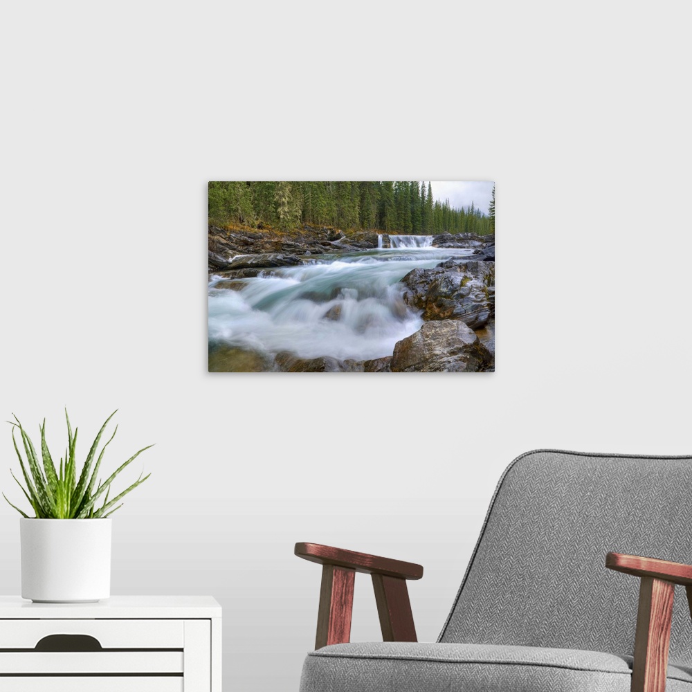 A modern room featuring Waterfall In Sheep River In The Canadian Rocky Mountains