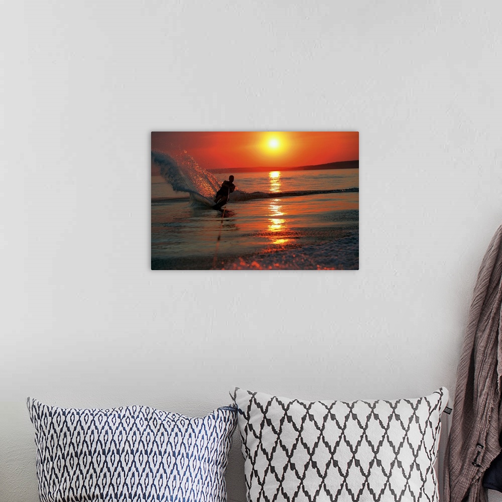 A bohemian room featuring Waterskiing at sunset