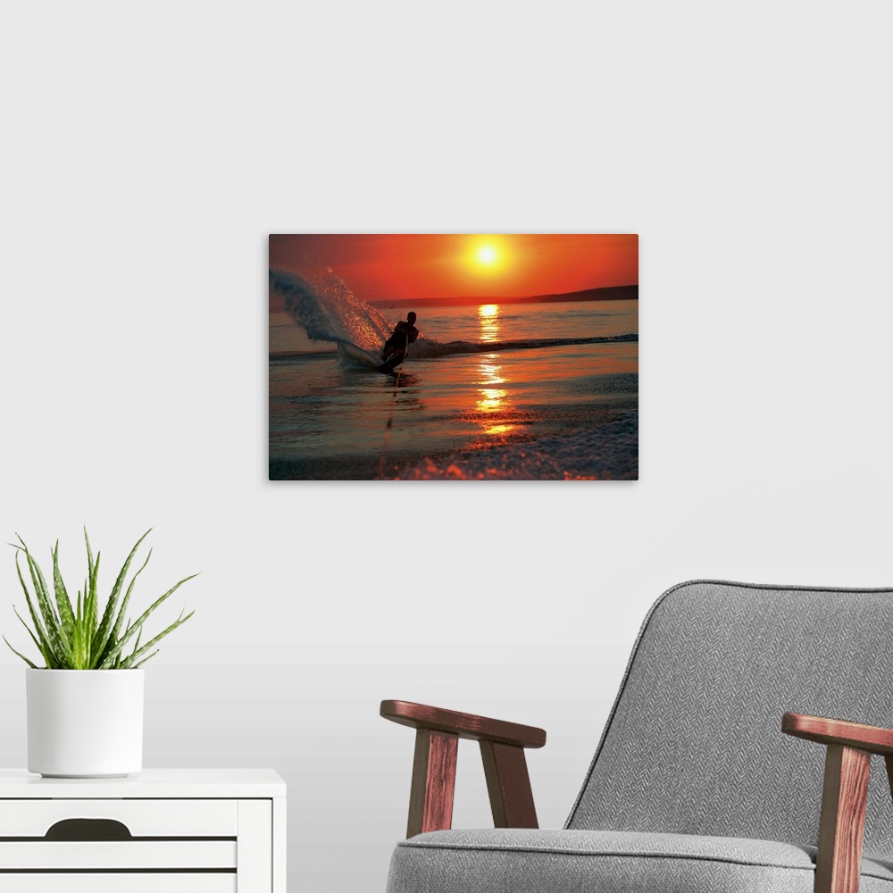 A modern room featuring Waterskiing at sunset