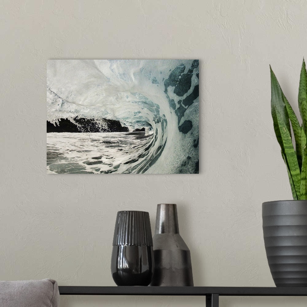 A modern room featuring Wave breaking over shallow reef.