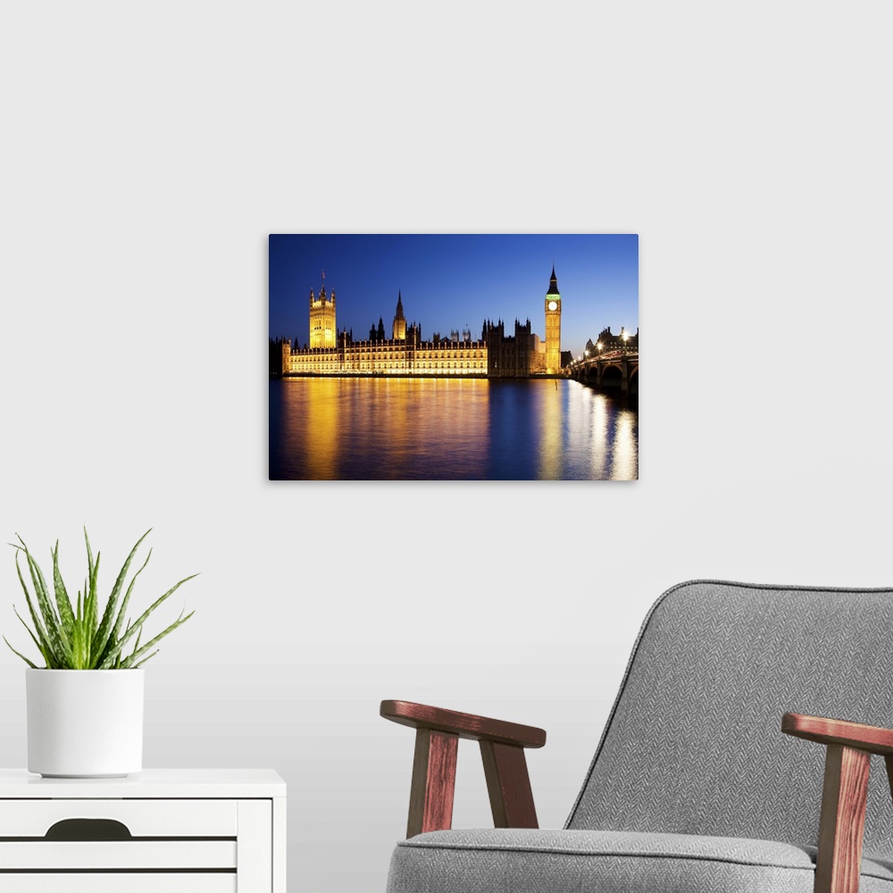A modern room featuring Westminster Bridge and the Houses of Parliament viewed over the river Thames, London, England