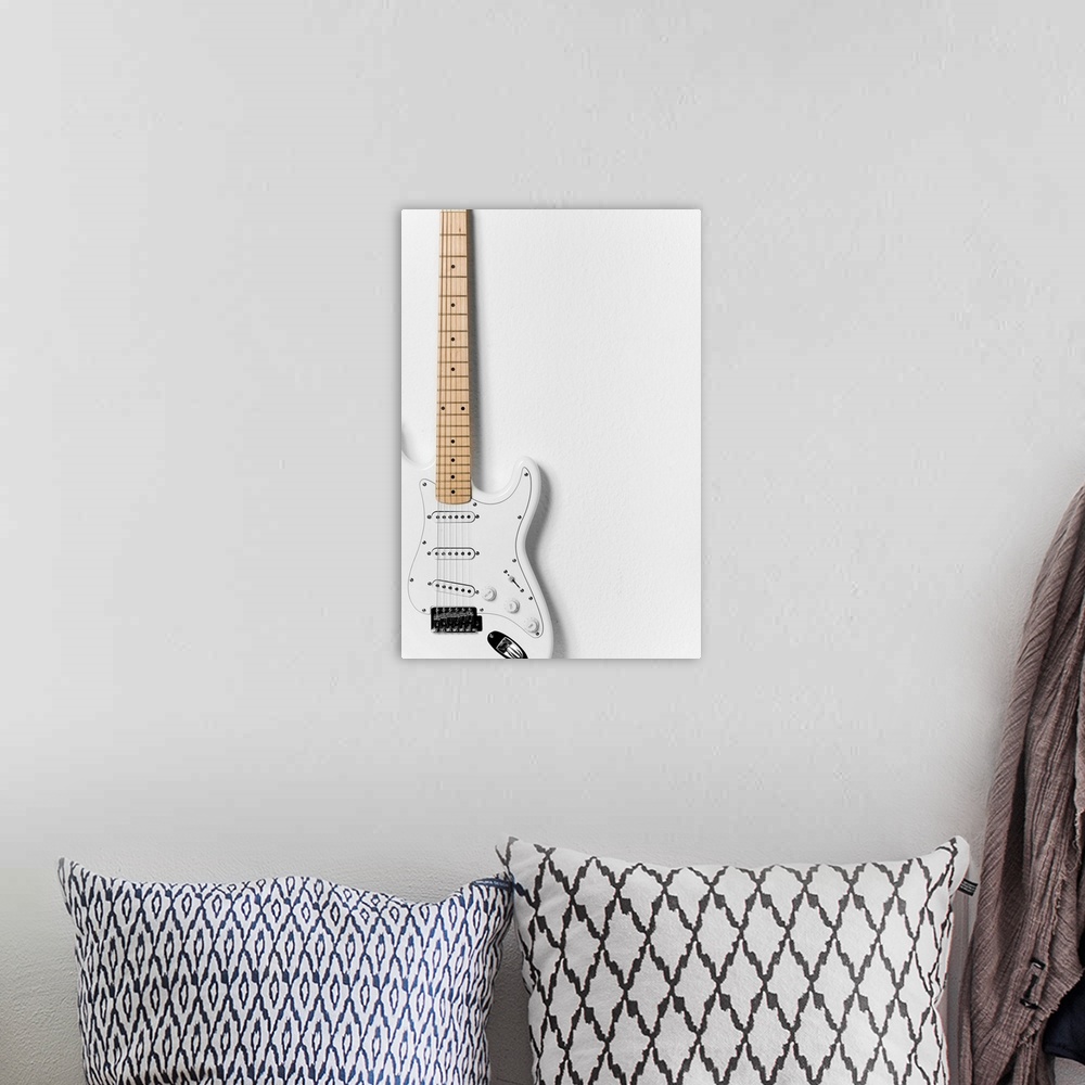 A bohemian room featuring White electric guitar