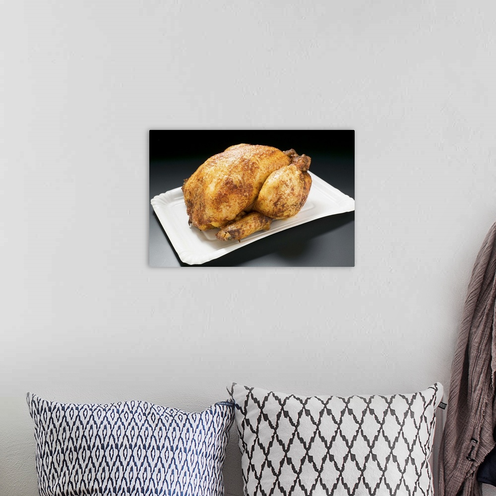 A bohemian room featuring Whole roast chicken on paper plate