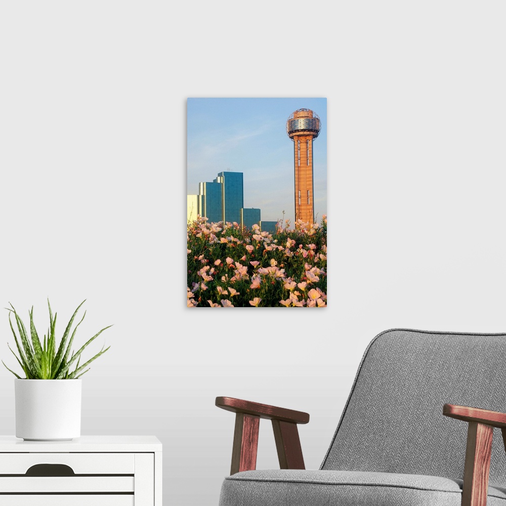 A modern room featuring 'Wildflowers and Dallas, TX skyline at sunset with Reunion Tower'