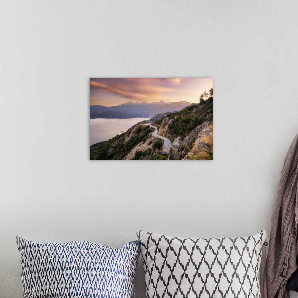 A bohemian room featuring The D824 road winding its way along the coast from Capu Rossu towards Piana on the west coast of ...