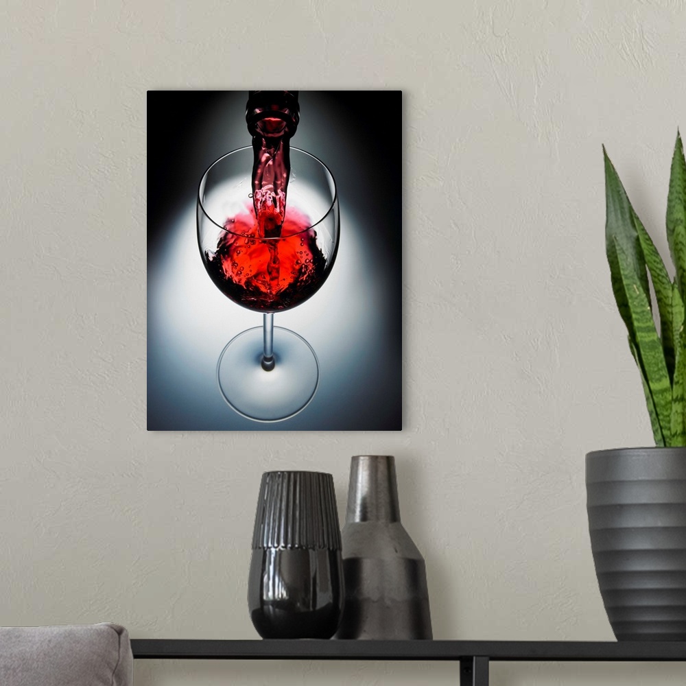 A modern room featuring Wine Poured In Glass