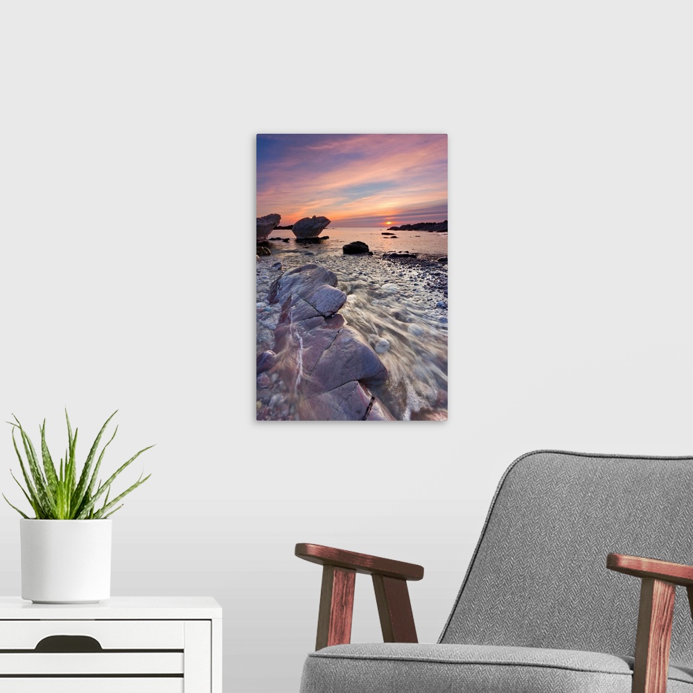 A modern room featuring Winter sunset from Heybrook Bay near Plymouth in South Devon. There were some lovely colors in sk...