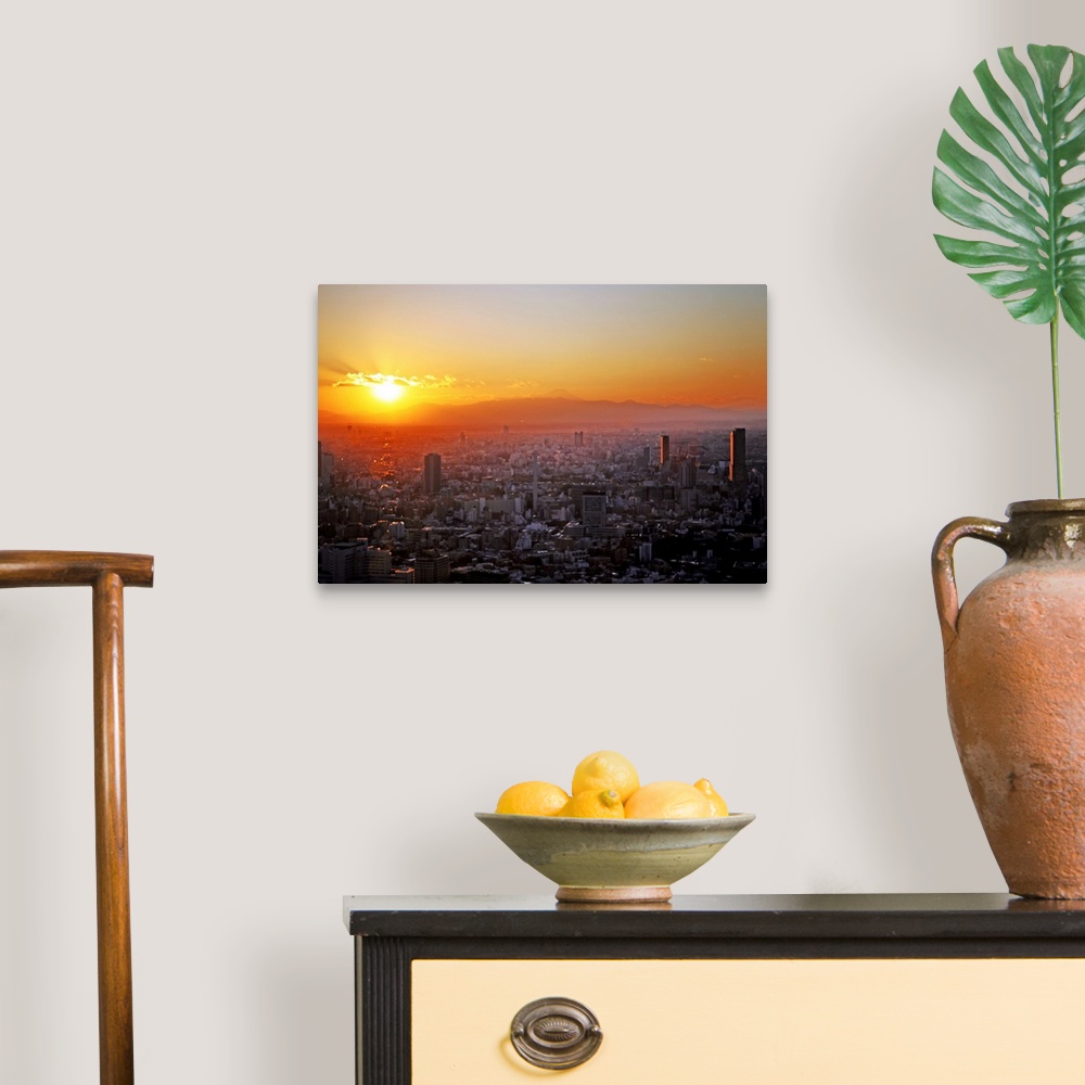 A traditional room featuring Winter sunset over Tokyo with Mount Fuji in distance, Japan