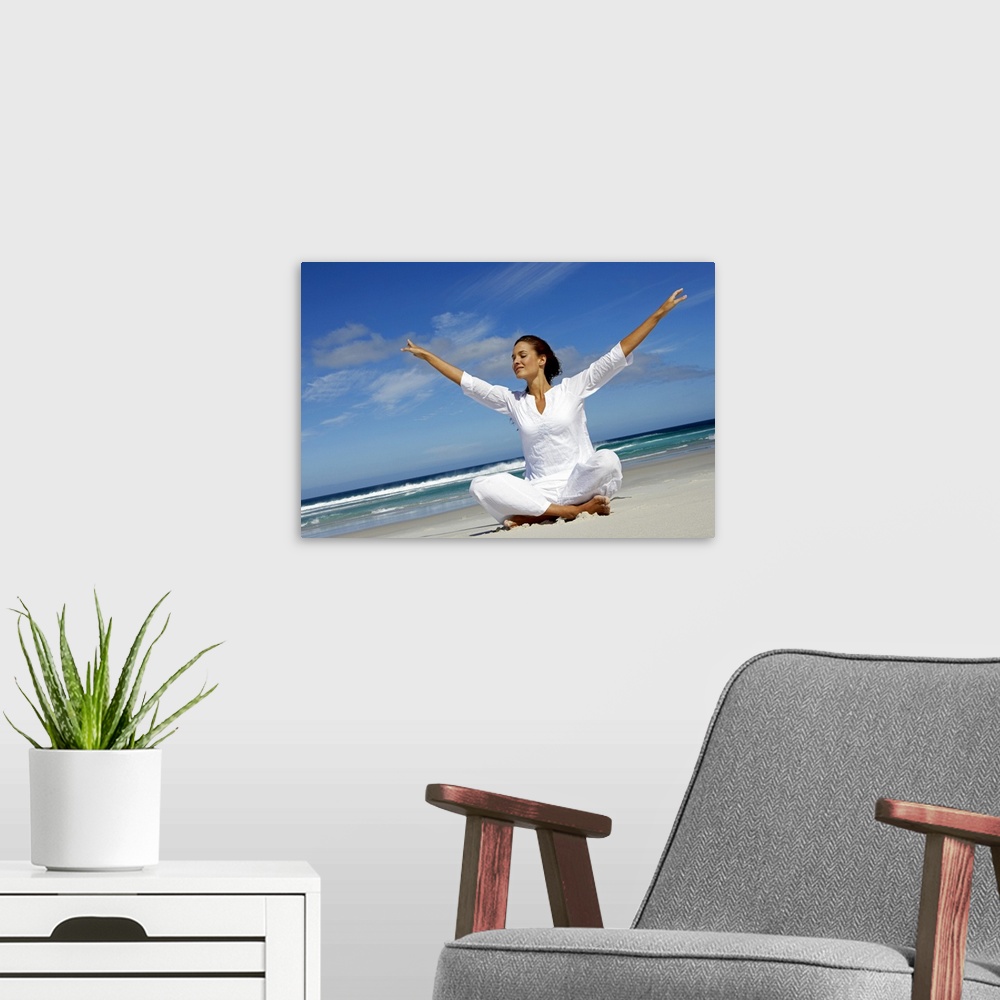 A modern room featuring Woman meditating at beach