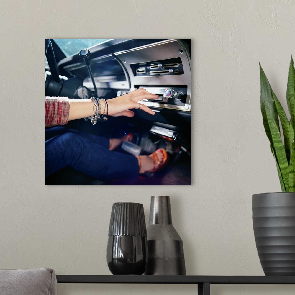 A modern room featuring Woman Using Car Stereo