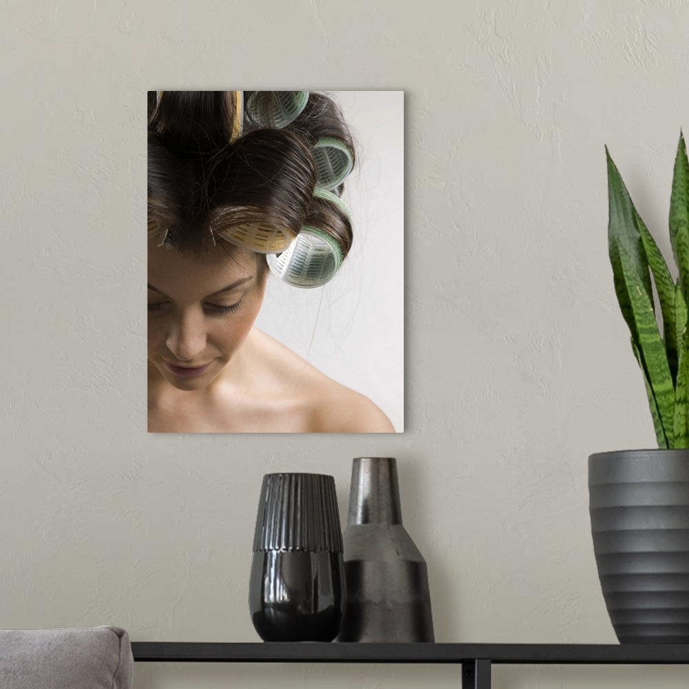 A modern room featuring Woman with hot rollers