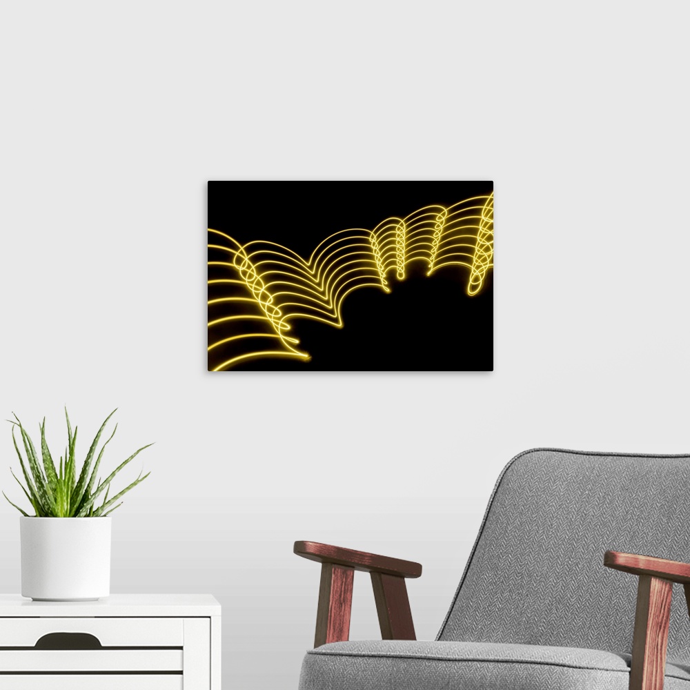 A modern room featuring yellow gold abstract  lights trails and patterns