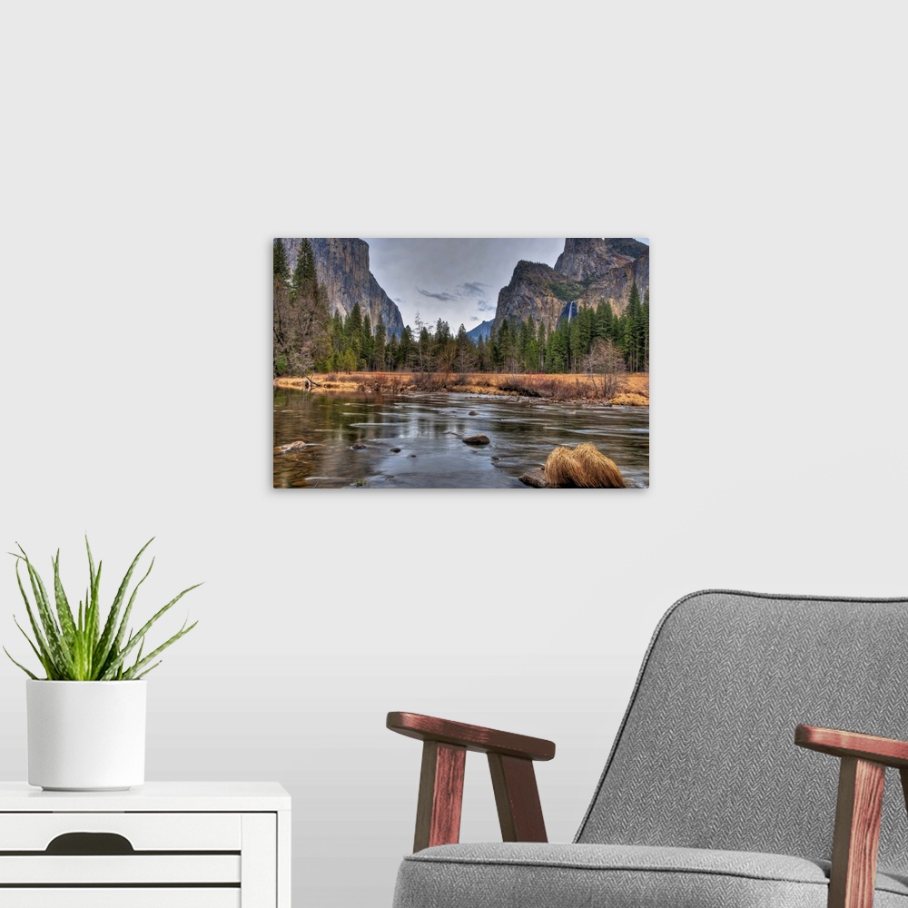 A modern room featuring Valley floor shot of the Merced River, El Capitan and Bridalveil Fall.