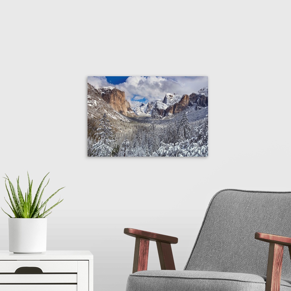 A modern room featuring Yosemite National Park, California after snow storm had dumped several inches for fresh snow on v...