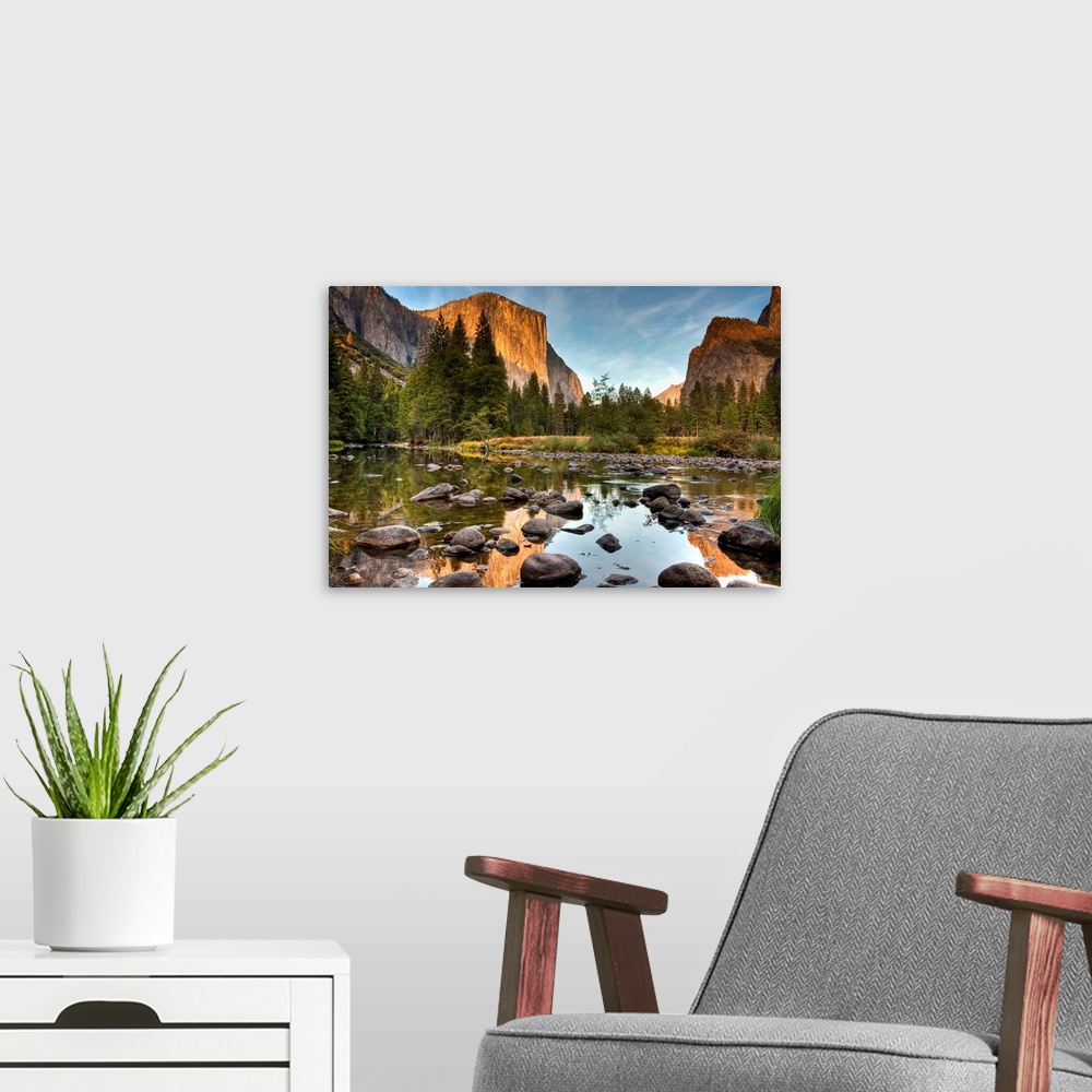 A modern room featuring Yosemite valley in the Merced river