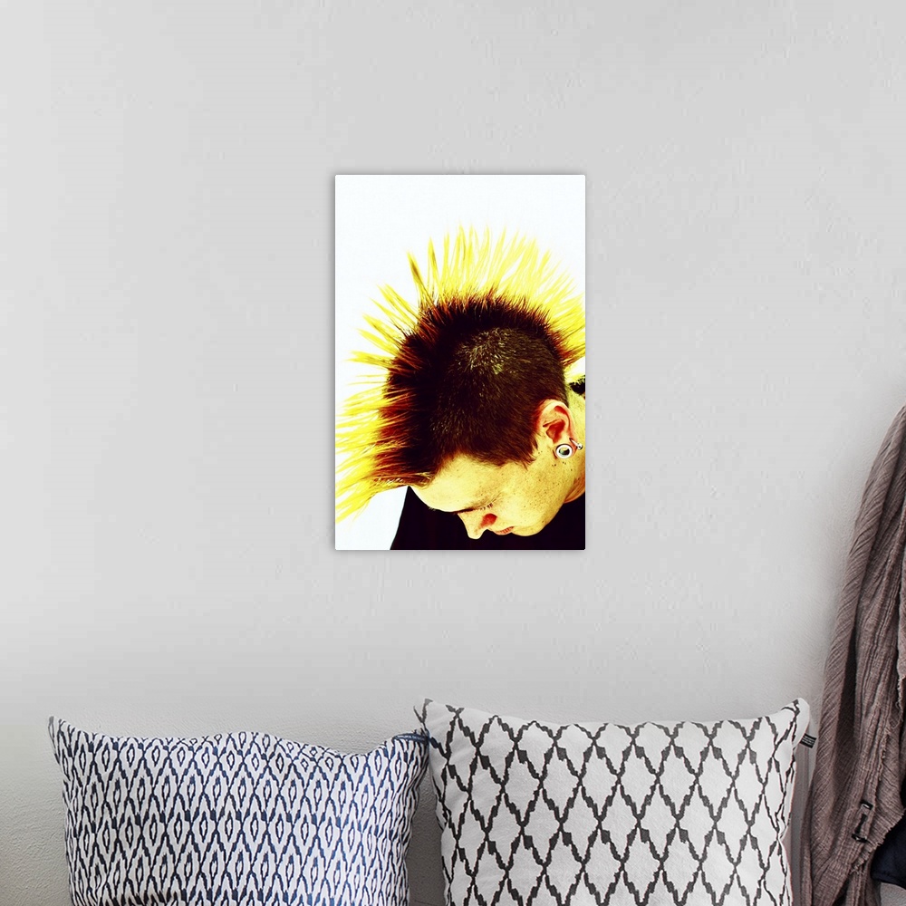 A bohemian room featuring Young man with mohawk