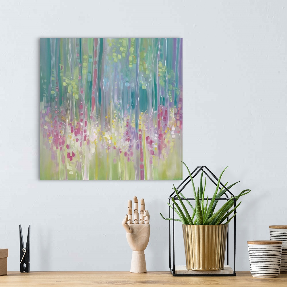 A bohemian room featuring Watercolor painting of an ethereal field full of flowers next to a forest.