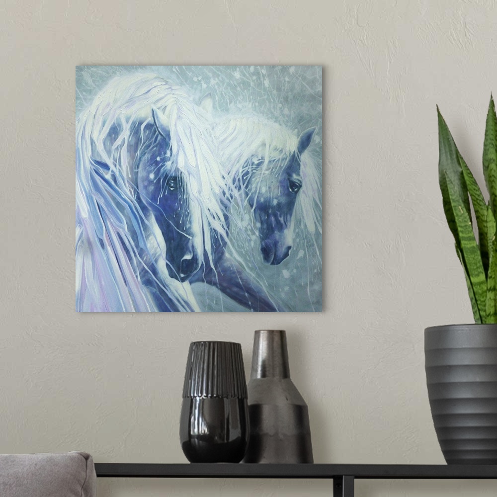 A modern room featuring Watercolor painting of a dream-like scene of two horses in shades of blue.