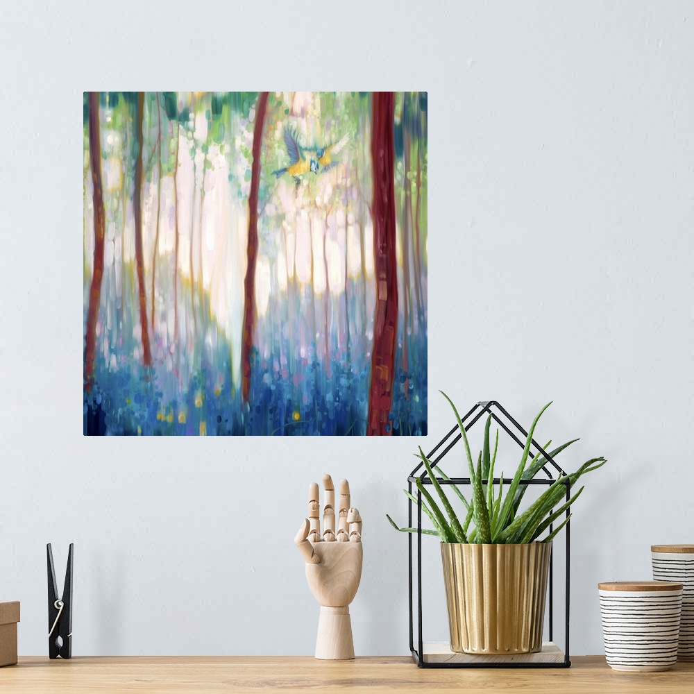 A bohemian room featuring Watercolor painting of a dream-like forest in varies shades of green.