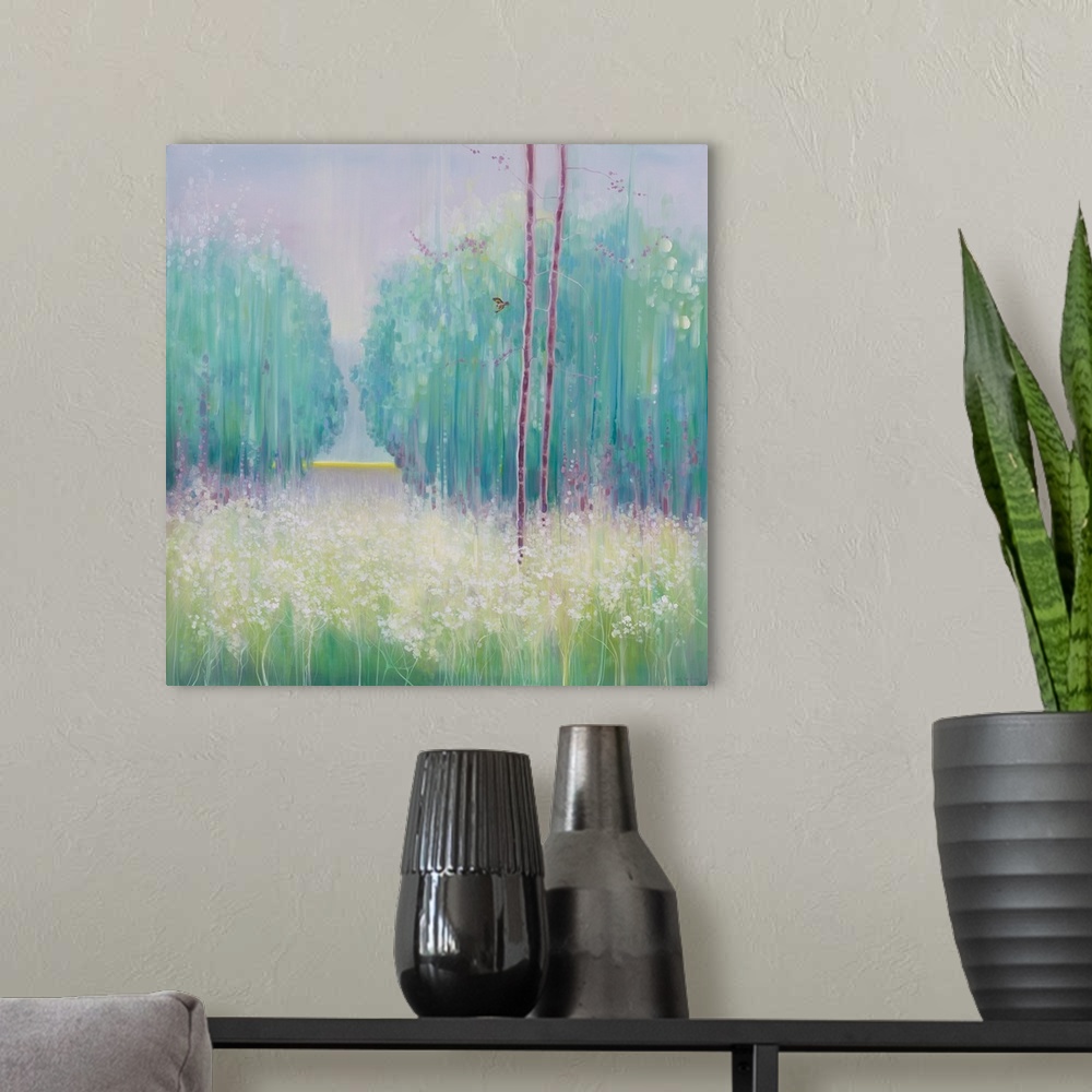 A modern room featuring Watercolor painting of a dream-like meadow in a forest in varies shades of green.