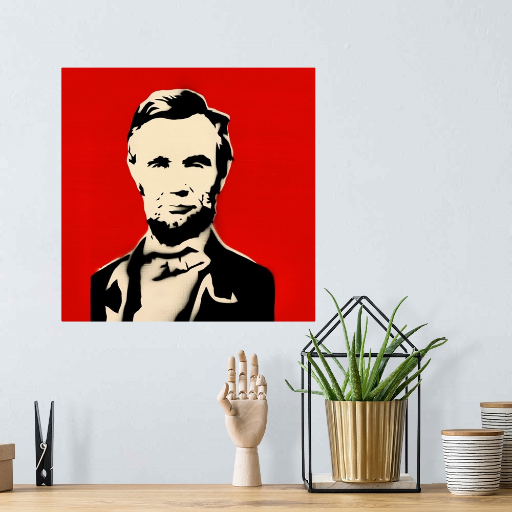 A bohemian room featuring Square spray art of Abraham Lincoln on a bright red background.