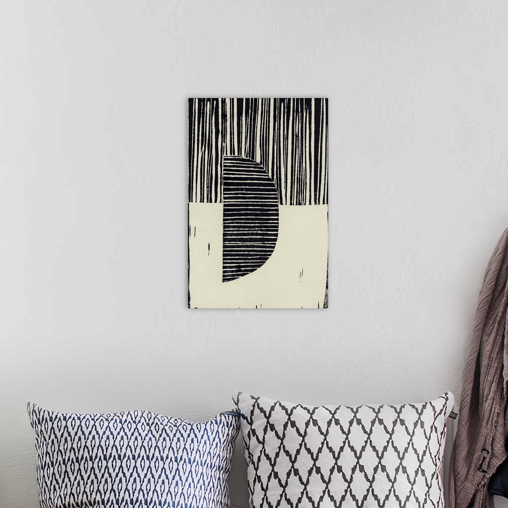 A bohemian room featuring Abstract linocut print with stripes and geometric shapes.